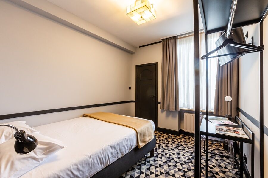 เลอชาเทอแลง บูติคโฮเต็ล Hotel บรัสเซลส์ ภายนอก รูปภาพ A room at the hotel